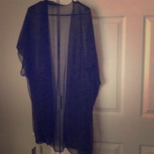 A black see through cover up